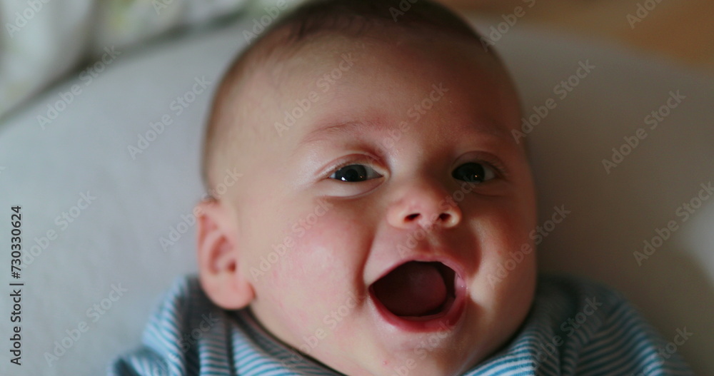 Happy baby portrait face looking to camera smiling and laughing Happy baby portrait face looking to camera smiling and laughing