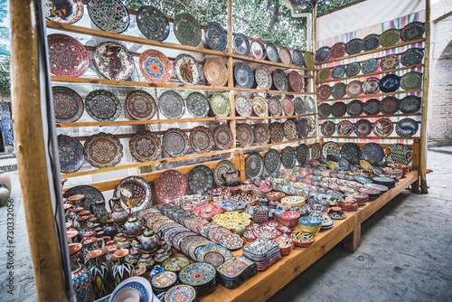 Decorative souvenirs in oriental style in the ancient city of Bukhara in Uzbekistan photo