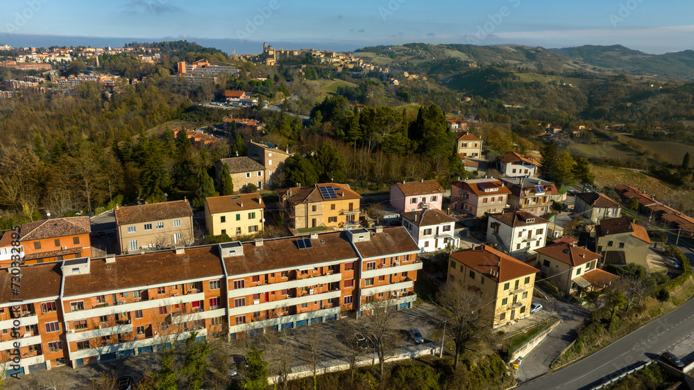 Aerial view on buildings on the outskirts of Urbino, Italy.