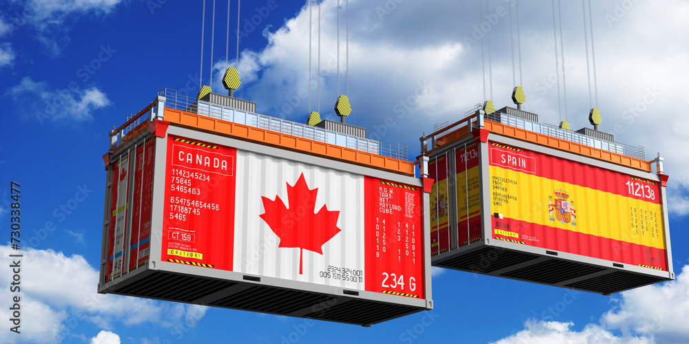 Shipping containers with flags of Canada and Spain - 3D illustration