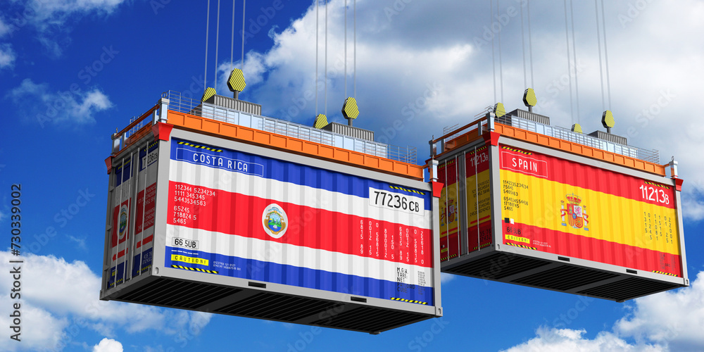 Shipping containers with flags of Costa Rica and Spain - 3D illustration