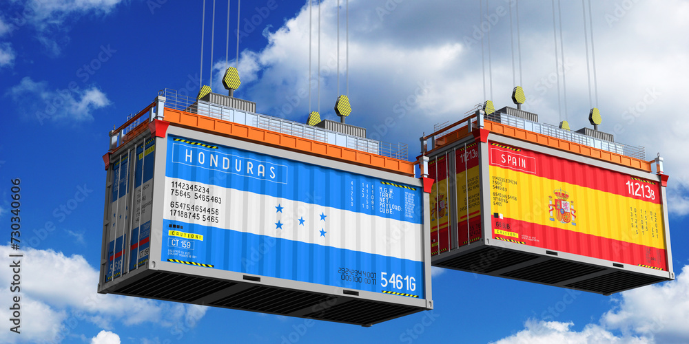 Shipping containers with flags of Honduras and Spain - 3D illustration