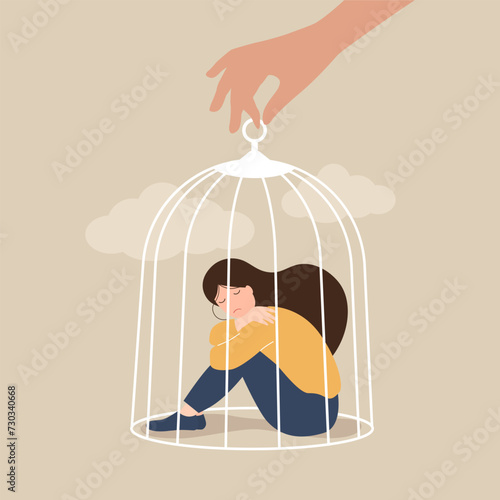 the hand of a psychologist opens a cage in which a sad girl sits. Psychological help concept. Treatment of depression concept