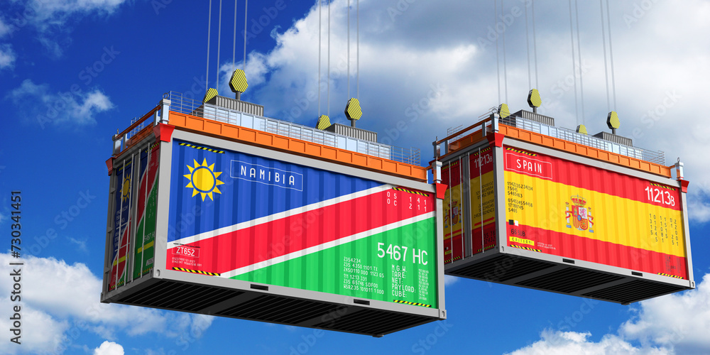 Shipping containers with flags of Namibia and Spain - 3D illustration Shipping containers with flags of Namibia and Spain - 3D illustration