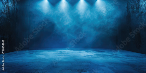 An illuminated stage featuring scenic lights and smoke effects. A blue vector spotlight casts its glow amidst the smoke, creating a voluminous light effect against a black backdrop photo