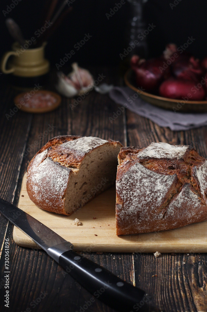 A loaf of rye bread in low key A loaf of rye bread in low key