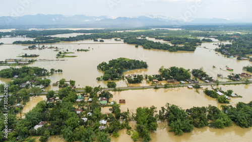 фотографія Aerial view of small town been Flooded countryside neighbourhood in Silchar, Assam India Barak River at 19 May 2022 Homes, houses overflowing muddy water concept of nature disaster climate change