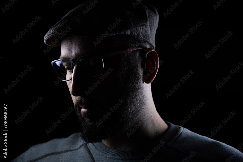 portrait for man in dark and light in middle age with face expression portrait for man in dark and light in middle age with face expression