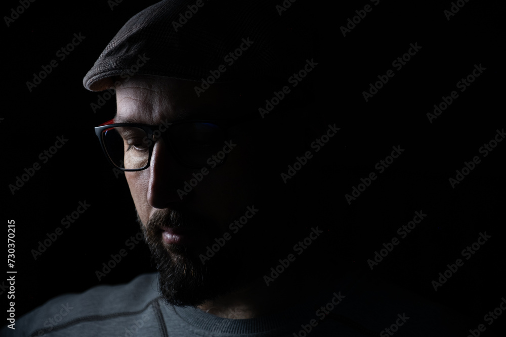 portrait for man in dark and light in middle age with face expression portrait for man in dark and light in middle age with face expression