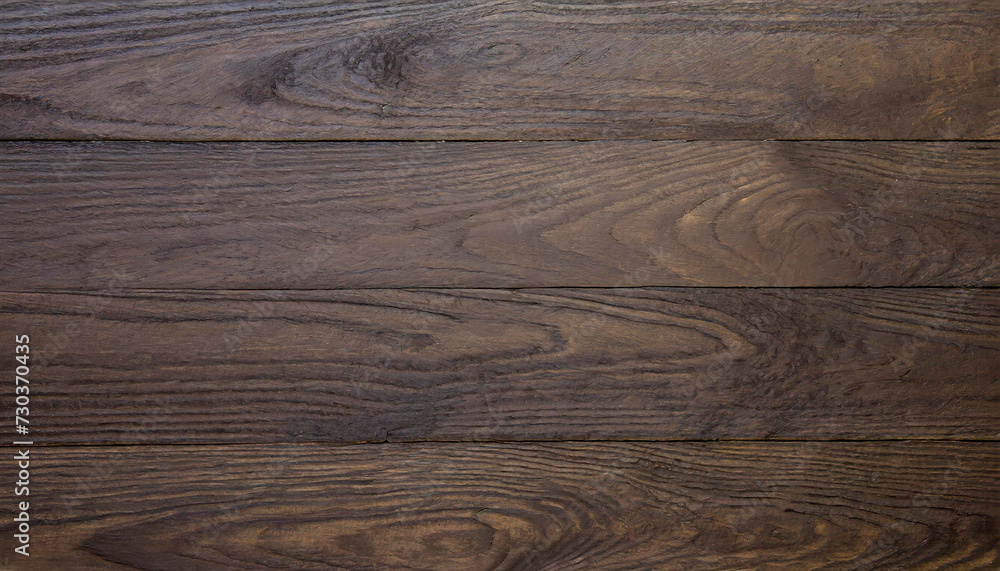 Minimalist background made up of dark treated wood structures. Rustic but also modern three-dimensional surface for a wooden covering. Brown wood texture. Texture Suitable for Copy Space. Minimalist background made up of dark treated wood structures. Rustic but also modern three-dimensional surface for a wooden covering. Brown wood texture. Texture Suitable for Copy Space.