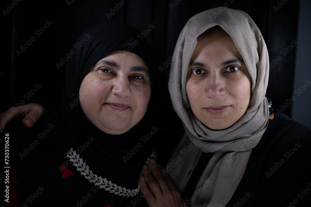 Middle east women's on black background in studio Middle east women's on black background in studio