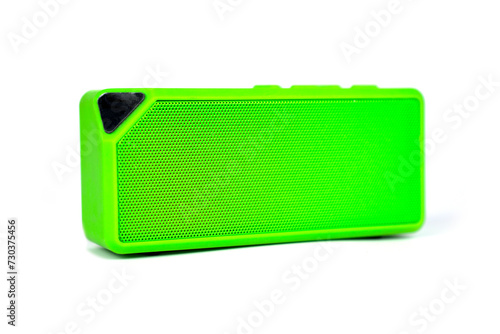 Wireless bluetooth speaker green isolated on white. Music amplifier close up