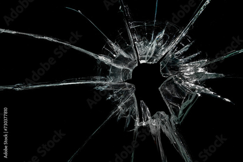 Cracked Pieces Broken Glass Hole on Black Background