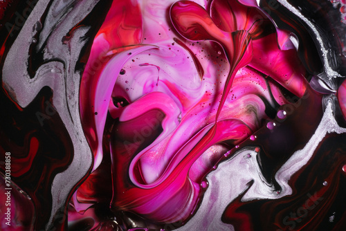 A dramatic blend of hot pink and black ink swirls with accents of white and purple, creating a bold, abstract fluid painting photo