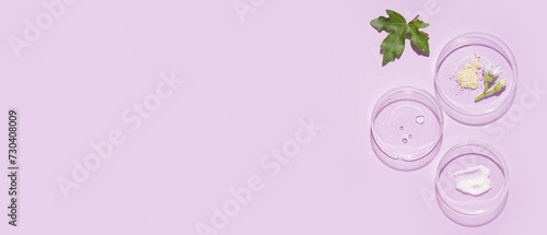 Petri dishes with samples on lilac background with space for text