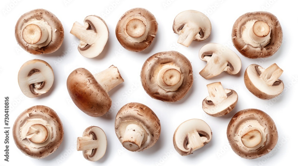 Set of fresh whole and sliced champignon mushrooms isolated on white background. Top view Set of fresh whole and sliced champignon mushrooms isolated on white background. Top view