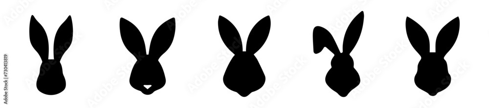 Set of silhouettes of rabbit heads. Easter Bunnies. Isolated on white background. A simple black icons of hares. Cute animals. Perfect for logo, emblem, pictogram, print, design element for greeting Set of silhouettes of rabbit heads. Easter Bunnies. Isolated on white background. A simple black icons of hares. Cute animals. Perfect for logo, emblem, pictogram, print, design element for greeting