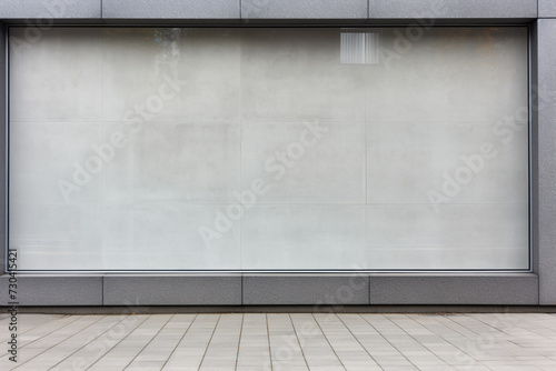 Commercial Building Fascia Logo And Signage Mockup The Exterior Wall Of A Contemporary Commercial Style Building With Aluminium Metal Composite Panels And Glass Windows For Logo And Sign Board Mockup  © Shahsoft Production