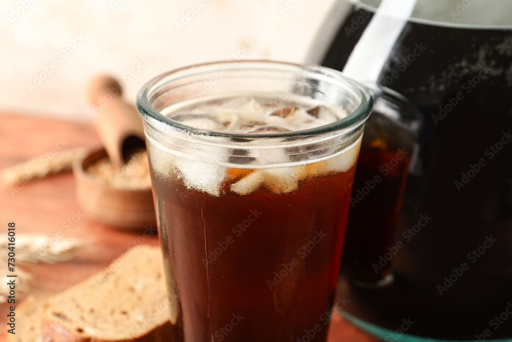 Glass of tasty kvass with ice, closeup Glass of tasty kvass with ice, closeup