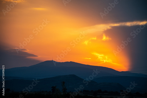 orange sunset in the mountains