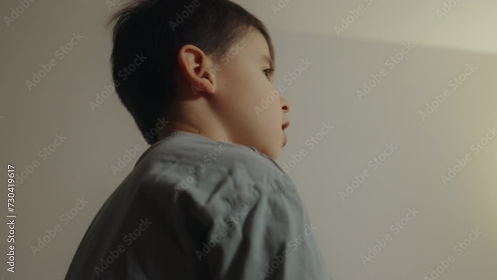 Young caucasian kid standing at home smiling cheerful playing gesturing with hands. Young caucasian kid standing at home smiling cheerful playing gesturing with hands.
