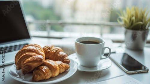 A serene business break captured with a cup of coffee  fresh croissants  and a mobile phone  symbolizing a blend of relaxation and connectivity.