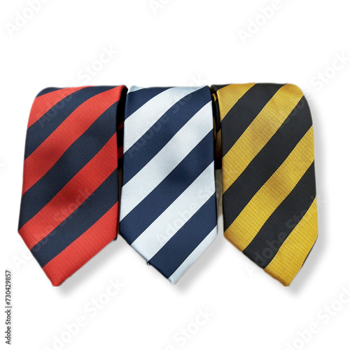 Three folded silk regimental ties on a white background