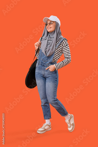 Young Muslim woman in hijab...