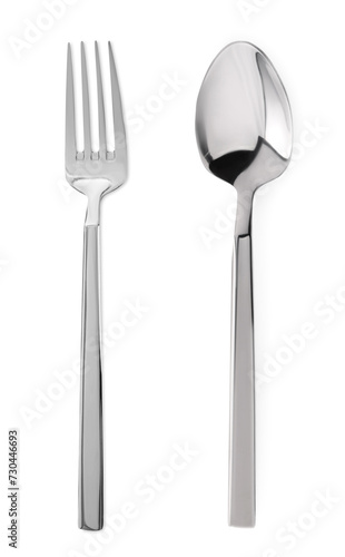 Silver fork and spoon isolated on white  top view