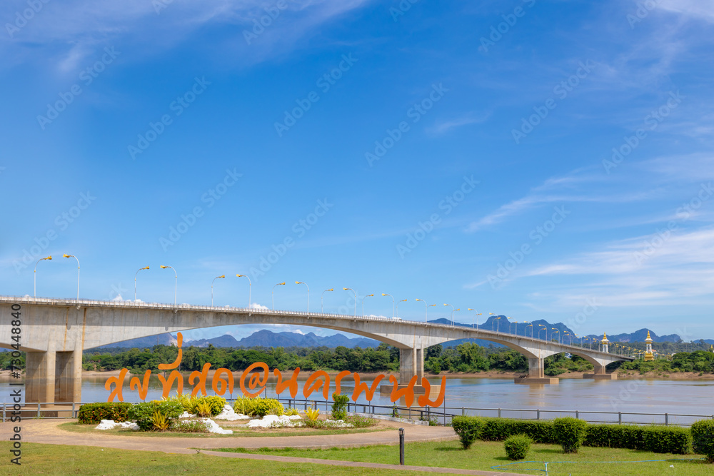 The third Thai–Lao border friendship bridge cross the Mekong river with letter sign (Thai Letter: Happiest at Nakhon Phanom) A bridge that connects Thailand with Thakhek, Khammouane Province in Laos. The third Thai–Lao border friendship bridge cross the Mekong river with letter sign (Thai Letter: Happiest at Nakhon Phanom) A bridge that connects Thailand with Thakhek, Khammouane Province in Laos.