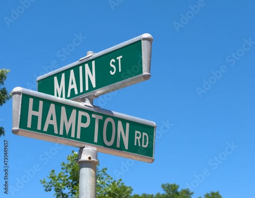 The Hamptons and Main Street Road Sign