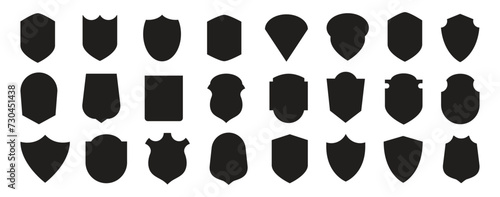 Set of silhouette icons of shields. Military shield insignia of different shapes. Vector elements.	 photo