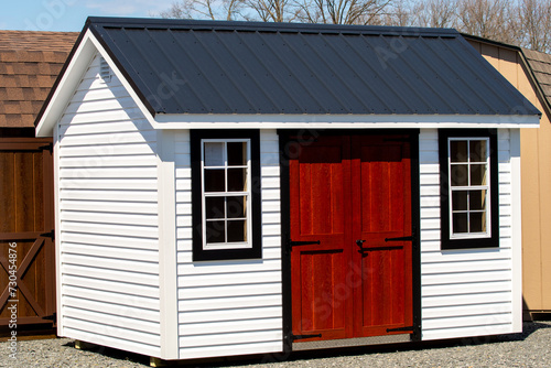 Fototapeta Naklejka Na Ścianę i Meble -  american style wooden shed exterior view door window new store style
