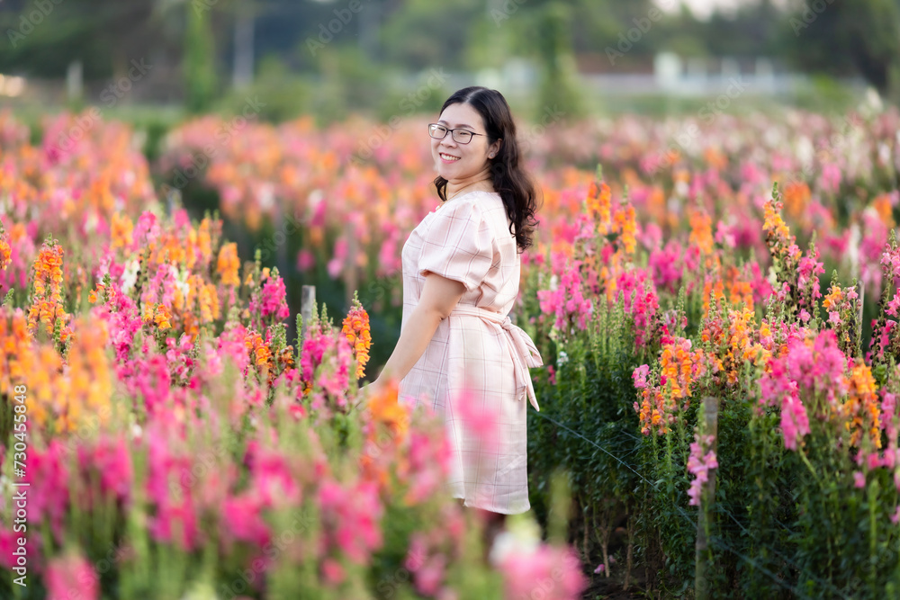 Portrait of asian Young woman happy traveler with white dress enjoying in white blooming or purple Michaelmas Daisy flower field in the nature garden of in Chiang Mai,Thailand,travel relax vacation Portrait of asian Young woman happy traveler with white dress enjoying in white blooming or purple Michaelmas Daisy flower field in the nature garden of in Chiang Mai,Thailand,travel relax vacation