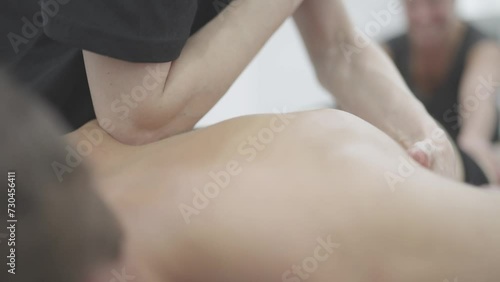 Detailed Work on a Client's Back by Expert Masseur