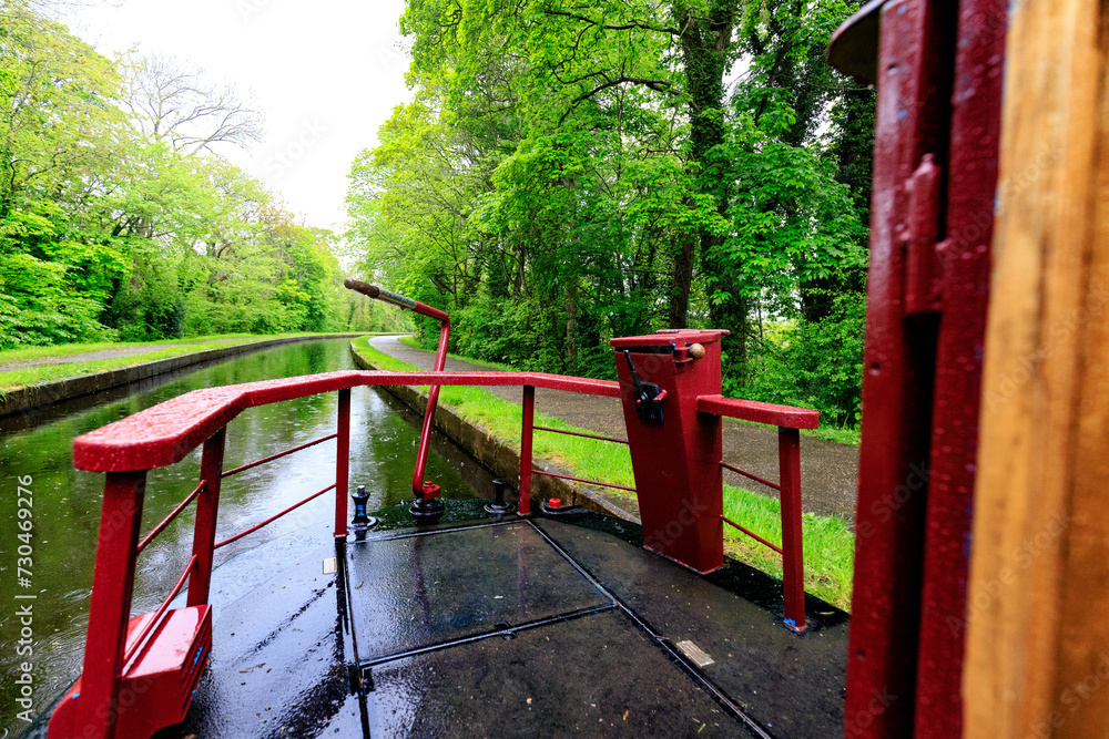 A Peaceful Day at the Wales Canal with a Moored Boat A Peaceful Day at the Wales Canal with a Moored Boat
