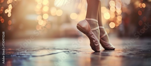 Close up beautiful legs of dancer in pointe on the floor blur background. AI generated image photo