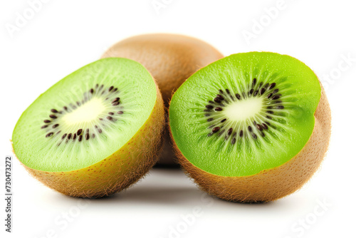 A close-up view of a fresh kiwi fruit, sliced to reveal its bright green interior. The fruit is contrasted against a white background, highlighting its natural, juicy, and sweet characteristics.
