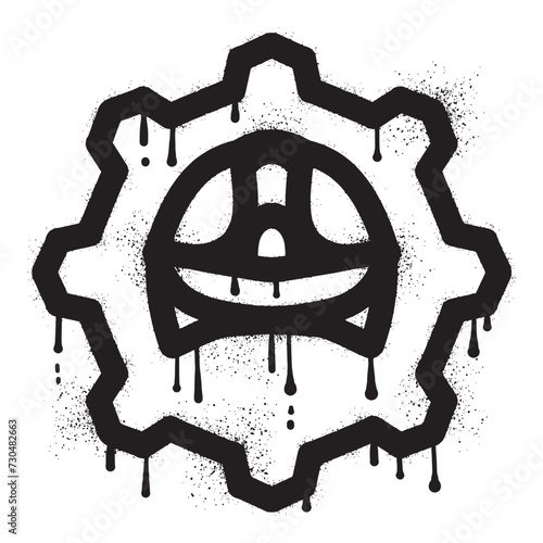 Hardhat and gear graffiti drawn with black spray paint