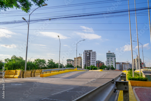 Empty highway photo with cityscape and buildings in the background  empty road in a modern city