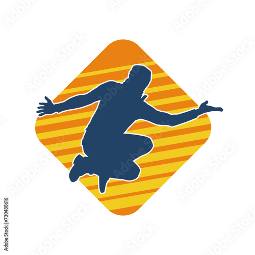 Silhouette of a male dancer in performing pose. Silhouette of a dancing man.
