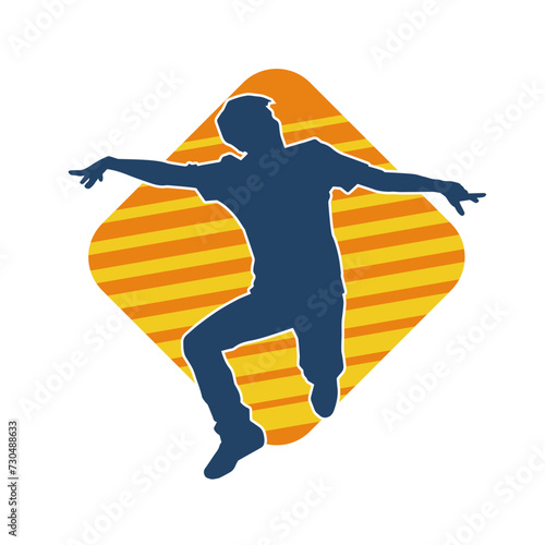 Silhouette of a male dancer in performing pose. Silhouette of a dancing man.
