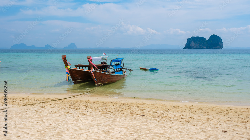 Longtail boats on the beach of Koh Ngai island tropical Island in the Andaman Sea Trang in Thailand