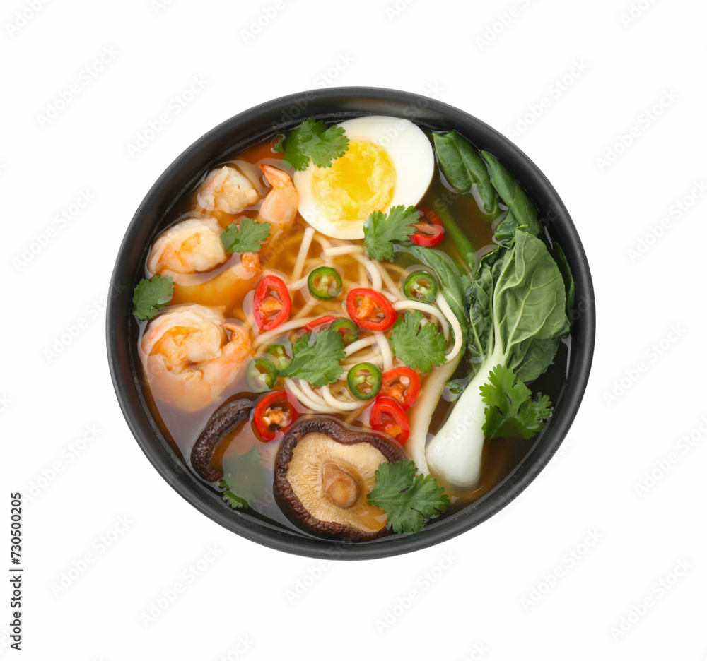 Delicious ramen with shrimps and egg in bowl isolated on white, top view. Noodle soup