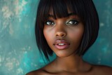 Stunning African American woman with a chic bob hairstyle and keratin straightening receiving care and spa treatments to enhance her natural beauty