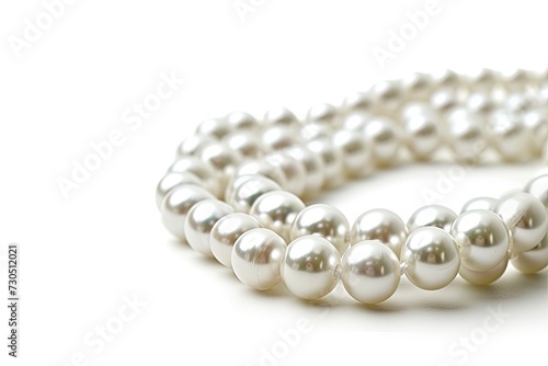 Pearl beads on white surface