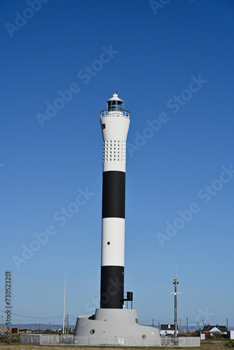 Lighthouse on the coast - maritime navigation.