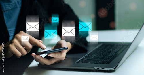 Businesswoman using laptop computer connecting internet online send and recieve email. Technology and business concept.
