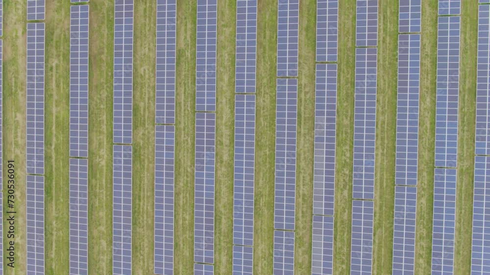 Solar panel array top down aerial symmetrical shot. Vast quantities Solar panel array top down aerial symmetrical shot. Vast quantities