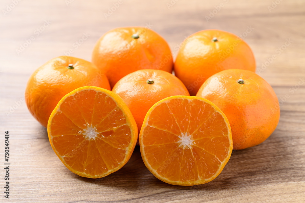 Mandarin orange fruit on wooden background, Tropical fruit Mandarin orange fruit on wooden background, Tropical fruit